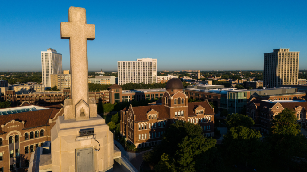 The cross atop Madonna della Strada Chapel overlooking Lake Shore Campus.